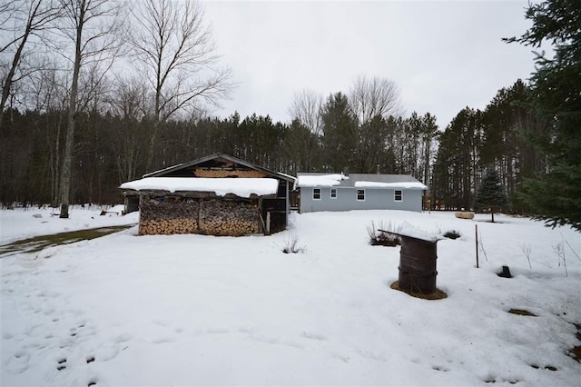 view of yard covered in snow