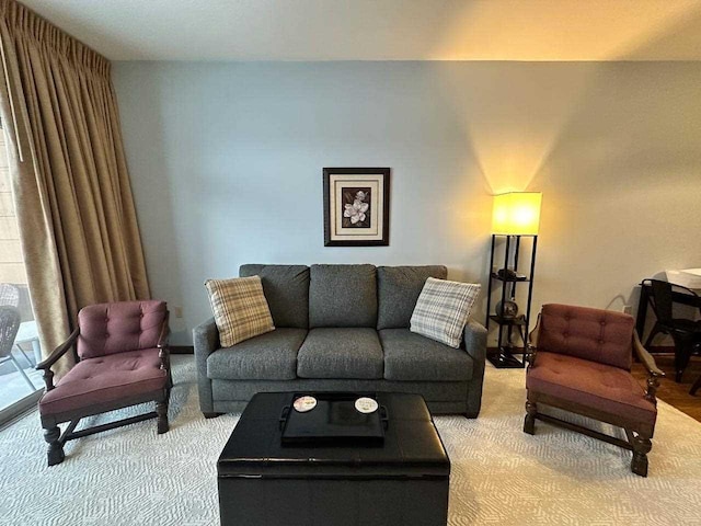 living room with light colored carpet