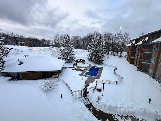 view of yard layered in snow