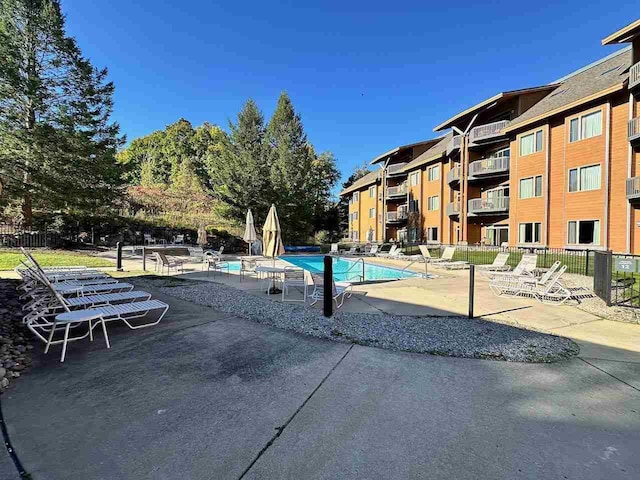 view of swimming pool featuring a patio