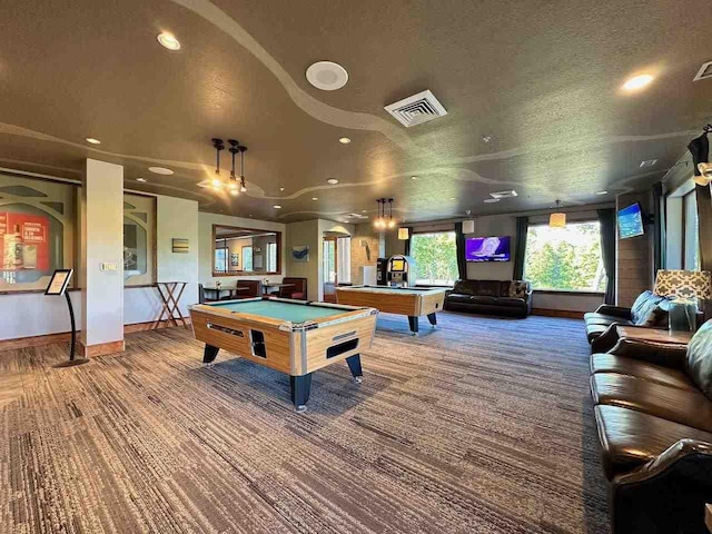 game room with carpet flooring, a textured ceiling, and billiards