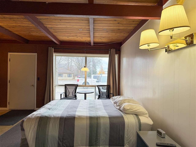 bedroom with beam ceiling, wooden walls, and wooden ceiling