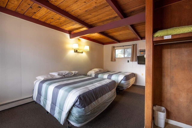 bedroom featuring baseboard heating, wooden ceiling, and beam ceiling