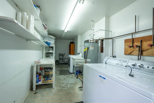 laundry room featuring washer / dryer and gas water heater