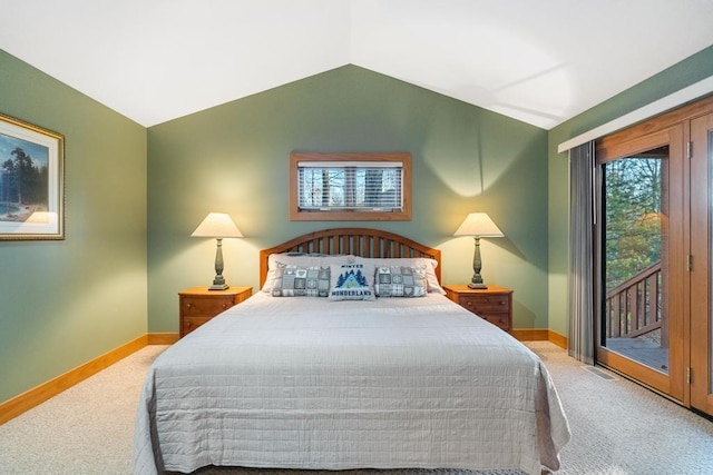 carpeted bedroom with access to exterior and lofted ceiling