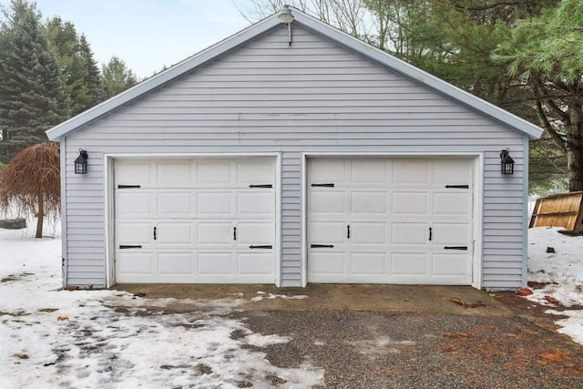 view of snow covered garage