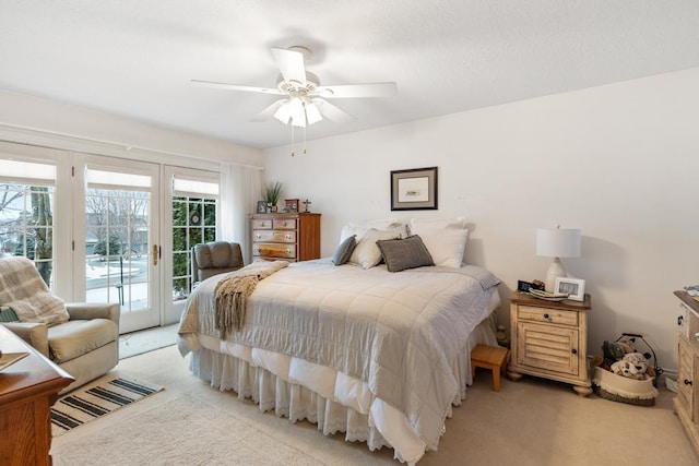 carpeted bedroom featuring access to outside and ceiling fan