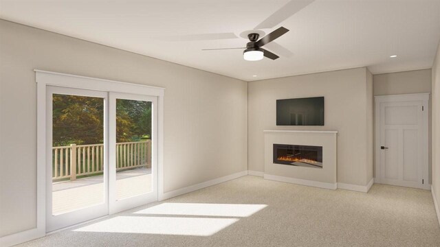 unfurnished living room featuring ceiling fan and light colored carpet