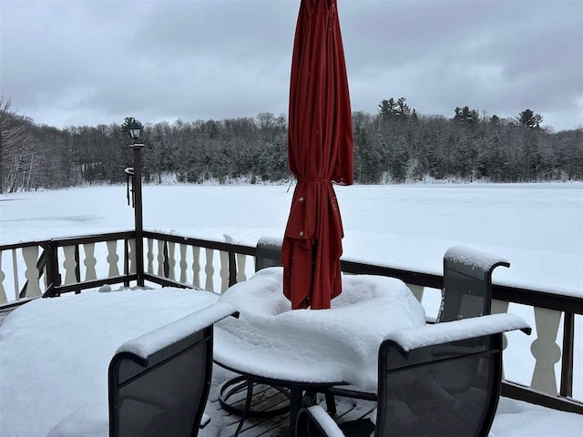 view of snow covered deck