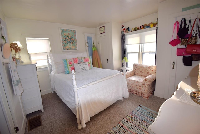 bedroom featuring carpet