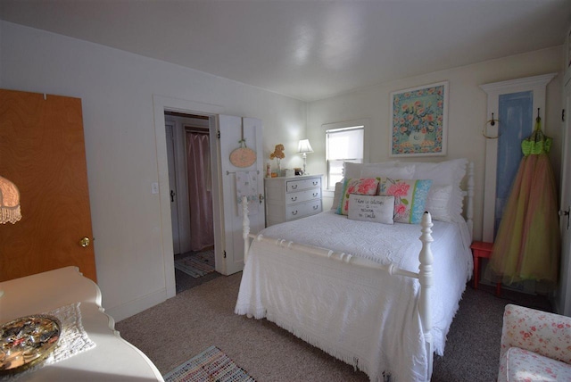 bedroom featuring carpet