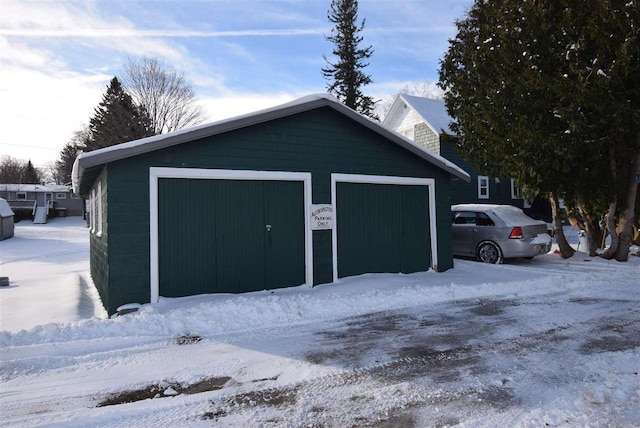 view of snow covered garage