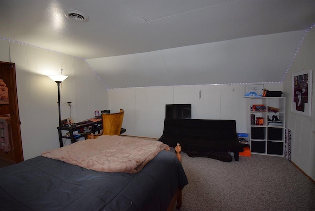 carpeted bedroom featuring vaulted ceiling