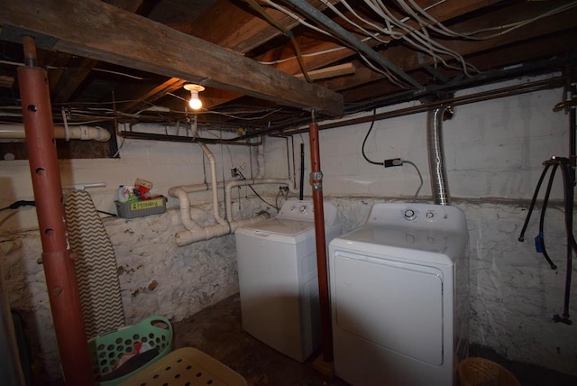 laundry room featuring separate washer and dryer