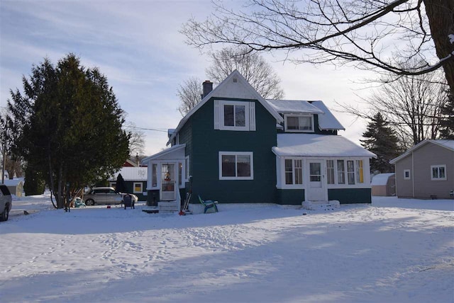 view of snow covered property