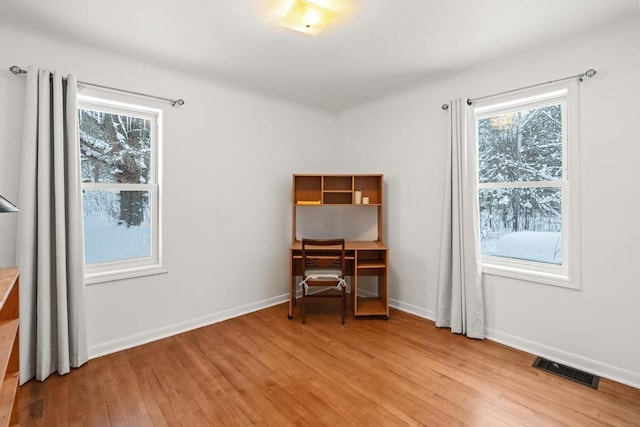 office area with light wood-type flooring