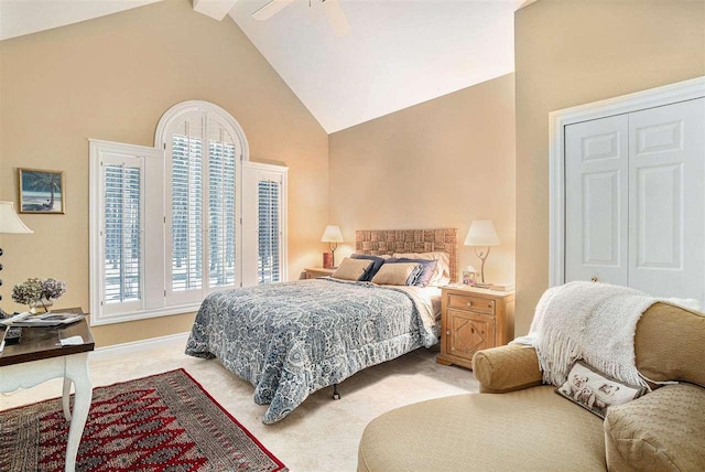 bedroom featuring ceiling fan, a closet, and multiple windows