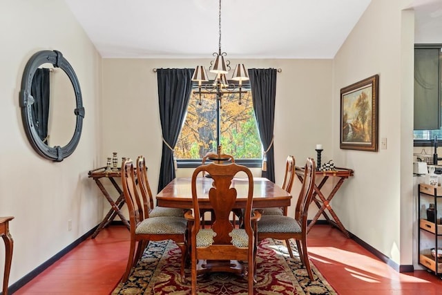 dining area featuring a chandelier and wood-type flooring