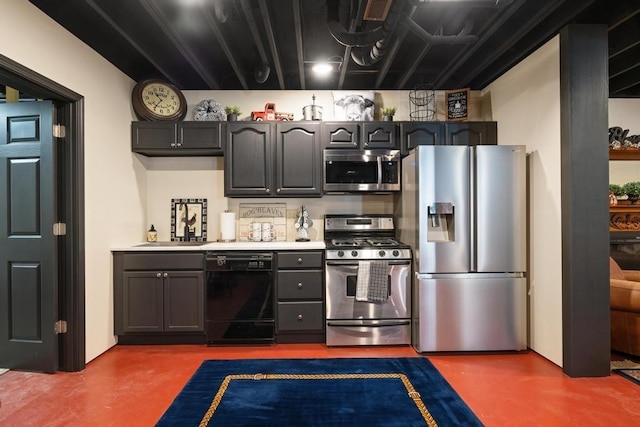 kitchen with sink, stainless steel appliances, and concrete floors