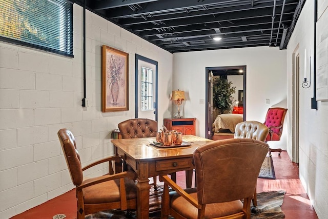 dining room featuring concrete floors