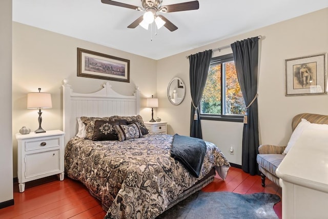 bedroom featuring ceiling fan and dark hardwood / wood-style flooring