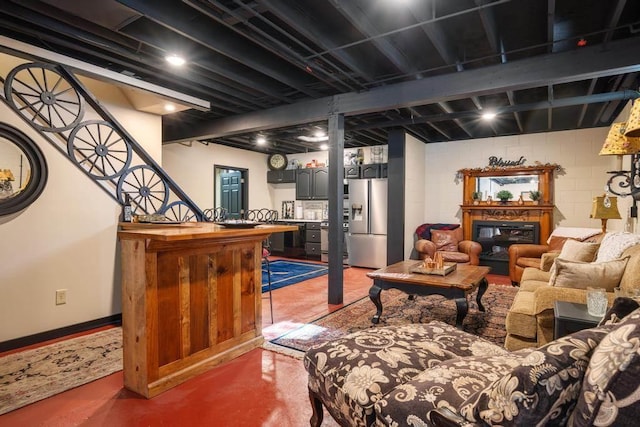 living room featuring concrete flooring