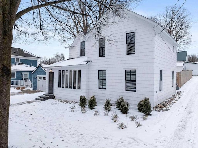 view of snow covered house