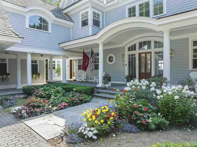 entrance to property with a porch