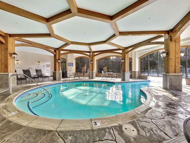 view of swimming pool with a patio area