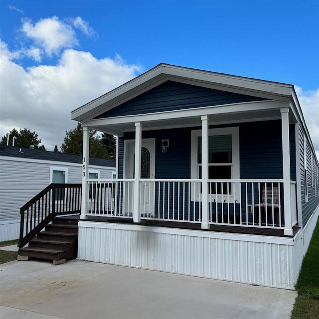 view of front of property featuring covered porch