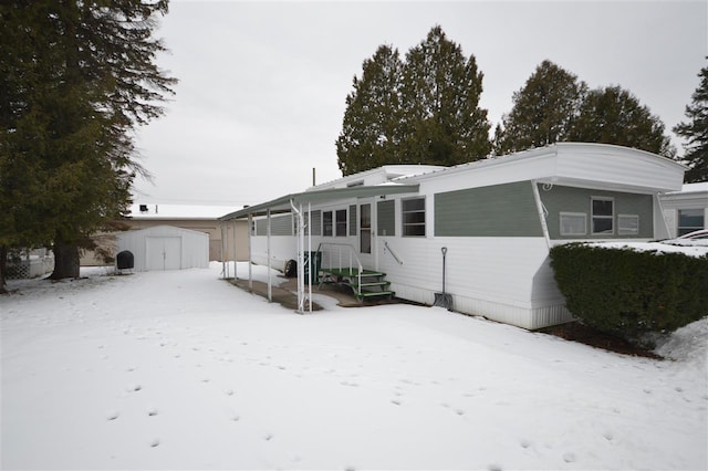 manufactured / mobile home featuring a storage unit