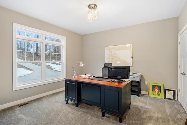 view of carpeted office space