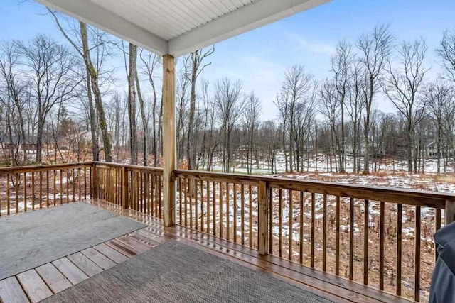 view of snow covered deck