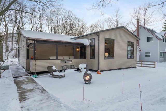 view of snow covered property