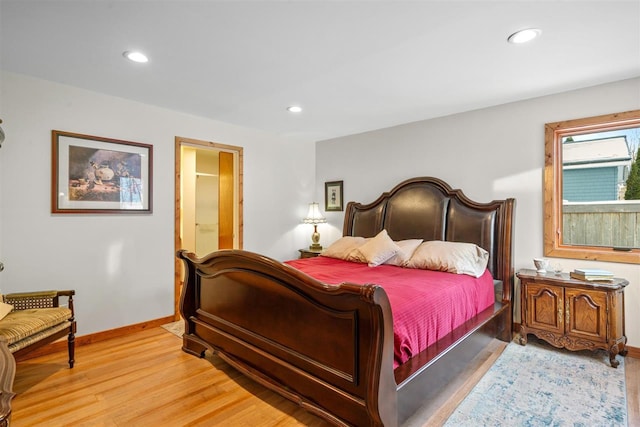 bedroom featuring light hardwood / wood-style flooring