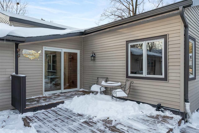 view of snow covered deck