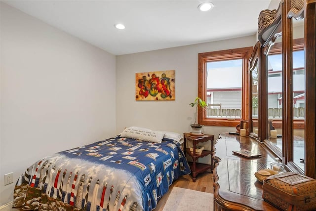 bedroom featuring light hardwood / wood-style flooring