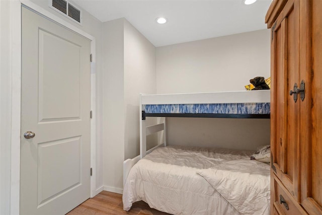 bedroom featuring light hardwood / wood-style flooring