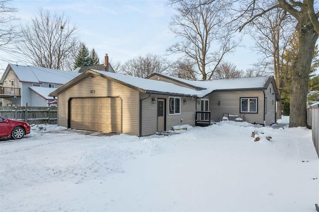 single story home with a garage