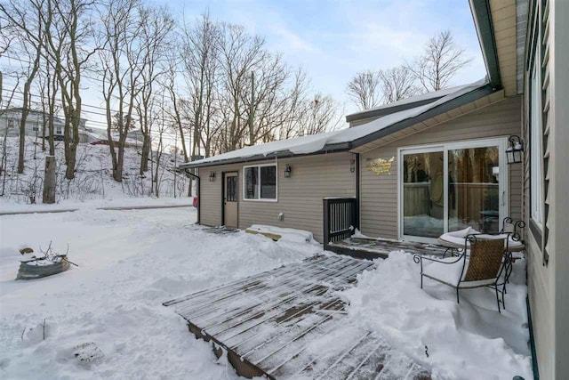 view of snow covered deck