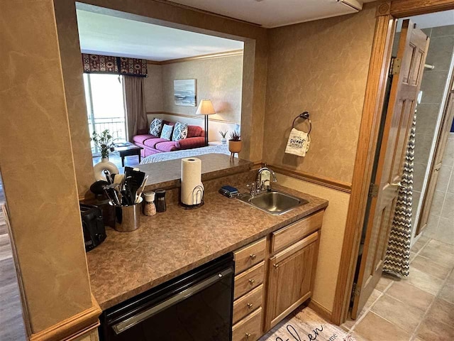 interior space with dishwasher, sink, and ornamental molding