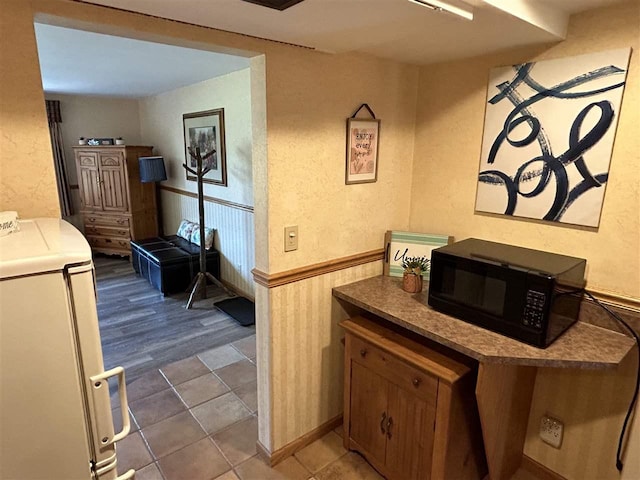 interior space featuring washer / clothes dryer and hardwood / wood-style flooring