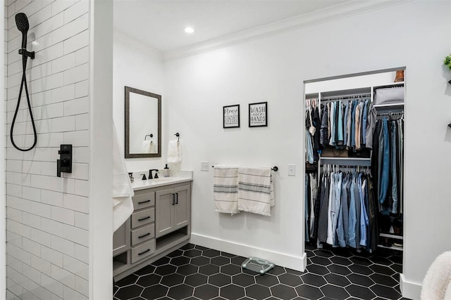 bathroom featuring vanity and ornamental molding