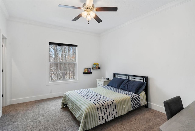 carpeted bedroom featuring ceiling fan and ornamental molding