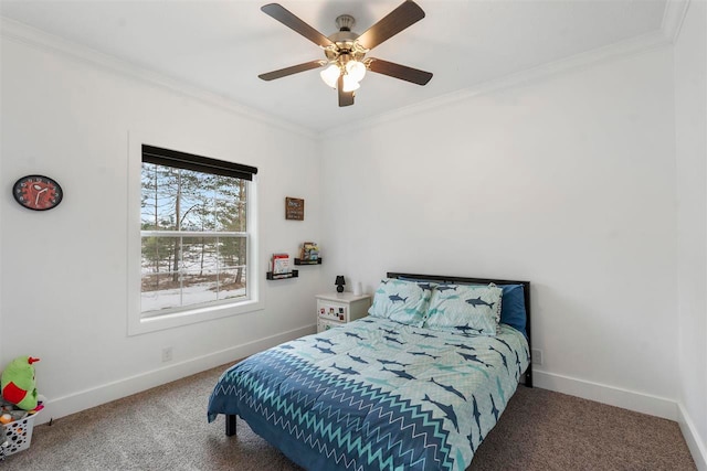 carpeted bedroom with ceiling fan and crown molding