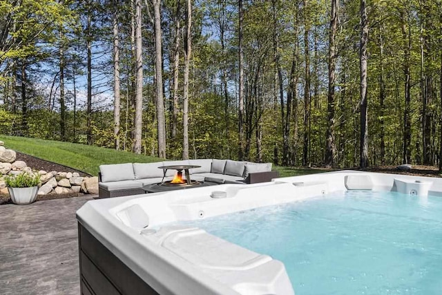 view of swimming pool with outdoor lounge area