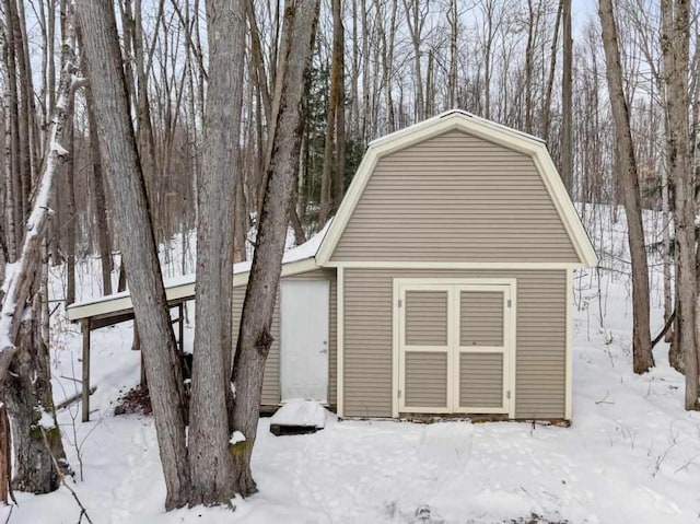 view of snow covered garage