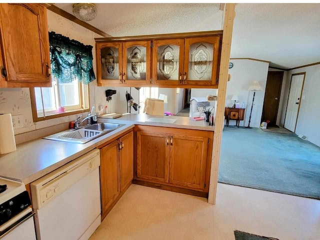 kitchen with light carpet, white appliances, crown molding, and sink