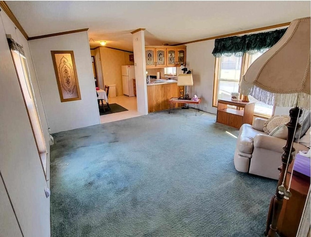 living room with crown molding, carpet floors, and vaulted ceiling