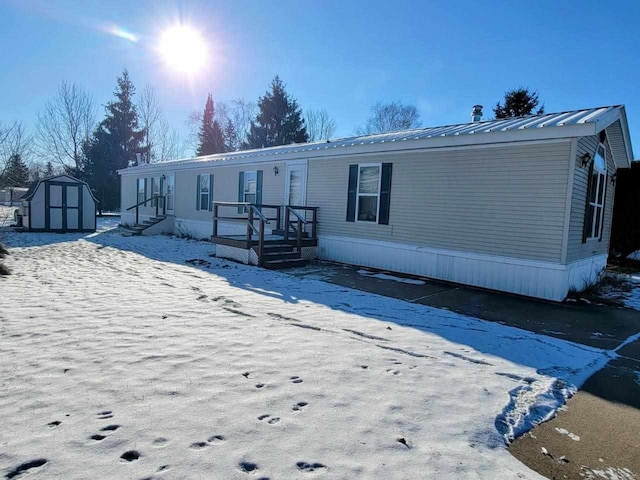 manufactured / mobile home with a shed